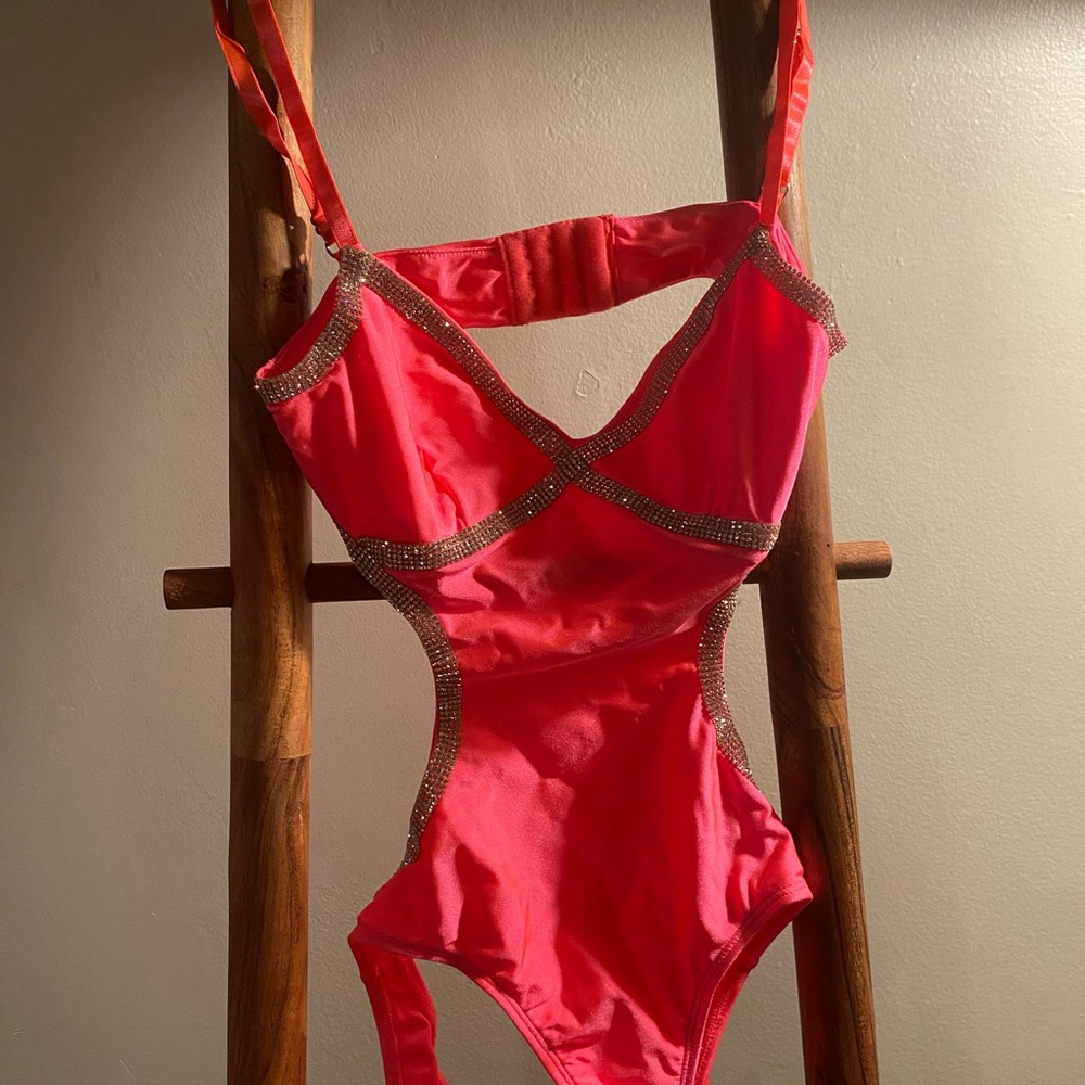 Hot pink one piece swimsuit.